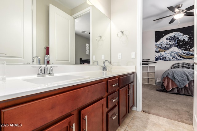 10221 E Wavelength Ave, Mesa, AZ 85212 - bathroom with double vanity, connected bathroom, tile patterned flooring, and ceiling fan