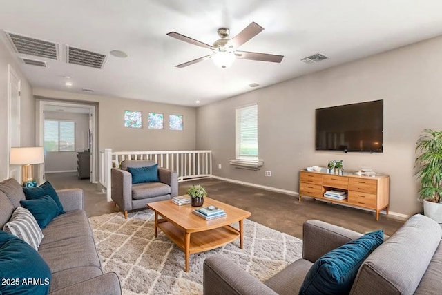 10221 E Wavelength Ave, Mesa, AZ 85212 - carpeted living room featuring a ceiling fan and recessed lighting
