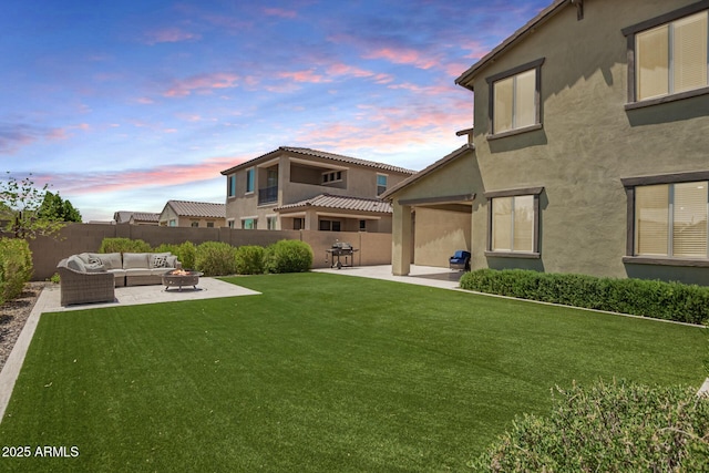 10221 E Wavelength Ave, Mesa, AZ 85212 - fenced backyard featuring an outdoor living space with a fire pit and a patio