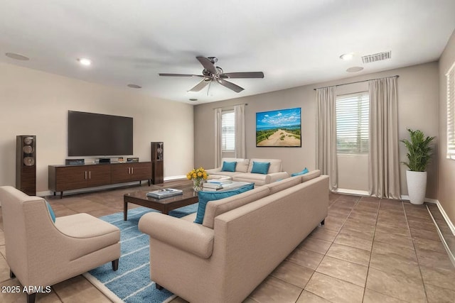 10221 E Wavelength Ave, Mesa, AZ 85212 - living area with plenty of natural light, a ceiling fan, recessed lighting, and tile patterned flooring