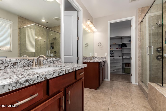10221 E Wavelength Ave, Mesa, AZ 85212 - bathroom featuring a shower stall, vanity, and tile patterned floors