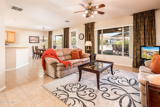 living room with light tile patterned floors and ceiling fan