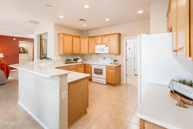 kitchen featuring white appliances, kitchen peninsula, light tile patterned floors, and light brown cabinets