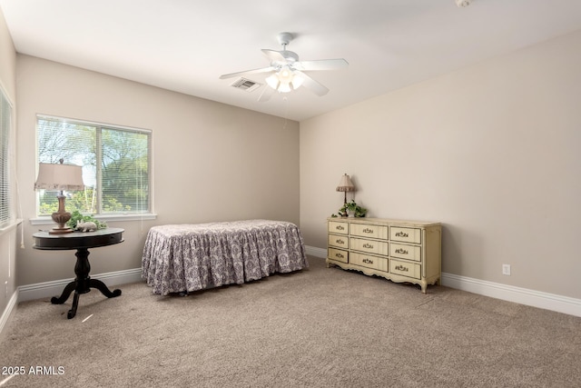 bedroom with carpet floors, baseboards, and visible vents