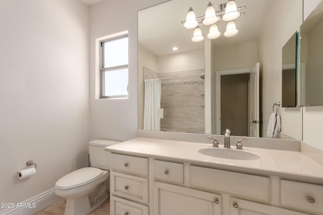 full bathroom with tiled shower, vanity, toilet, and tile patterned floors