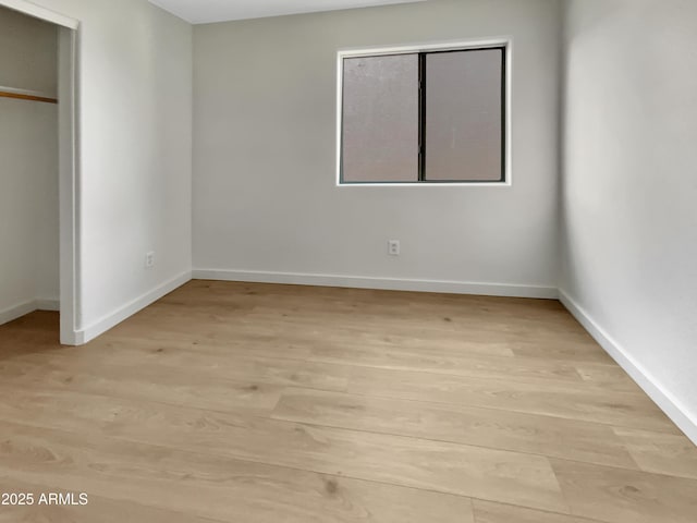 unfurnished bedroom featuring light hardwood / wood-style flooring