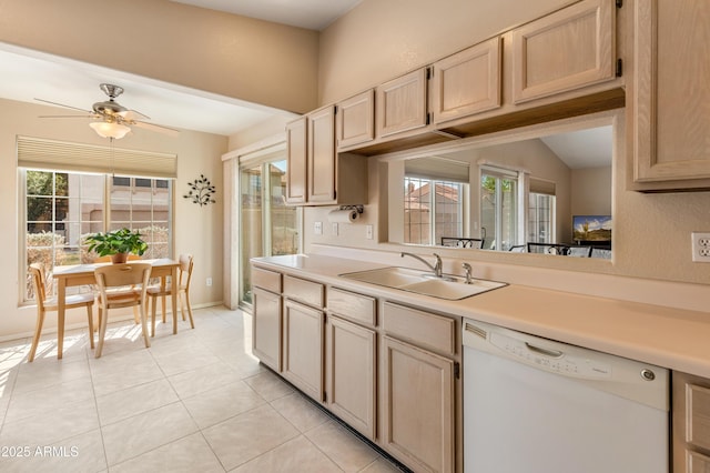 kitchen featuring light brown cabinetry, a sink, light countertops, light tile patterned floors, and dishwasher