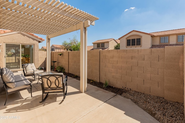 view of patio featuring a fenced backyard and a pergola