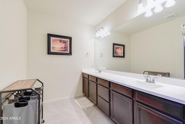 bathroom featuring tile patterned floors and vanity