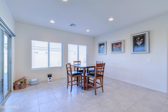 dining area featuring light tile patterned floors