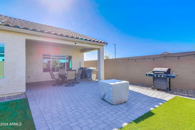 view of patio / terrace featuring a grill