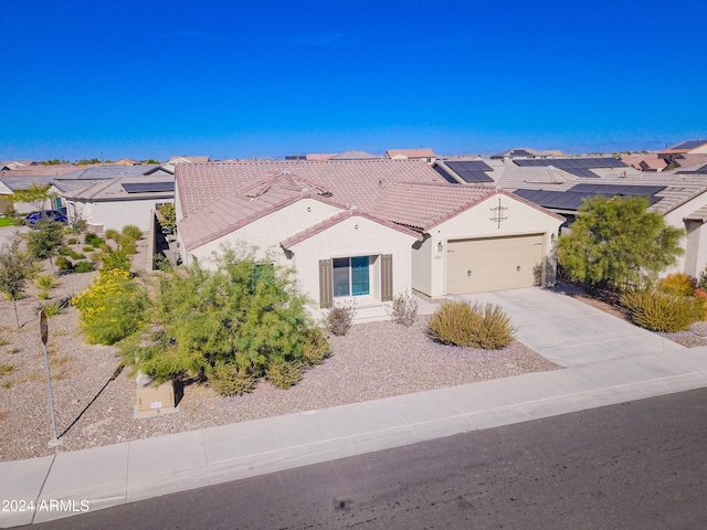 view of front of home with a garage