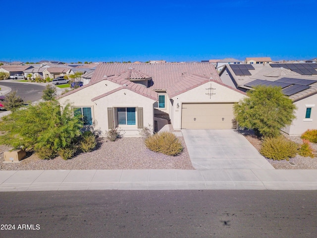 view of front of home with a garage