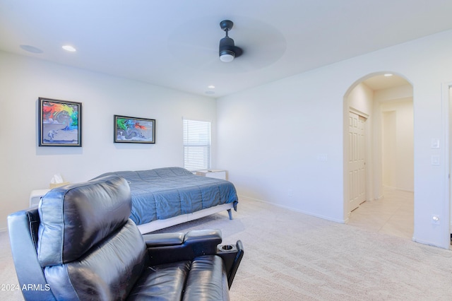 carpeted bedroom featuring ceiling fan