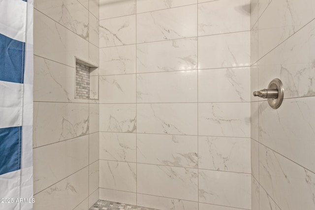 bathroom featuring curtained shower