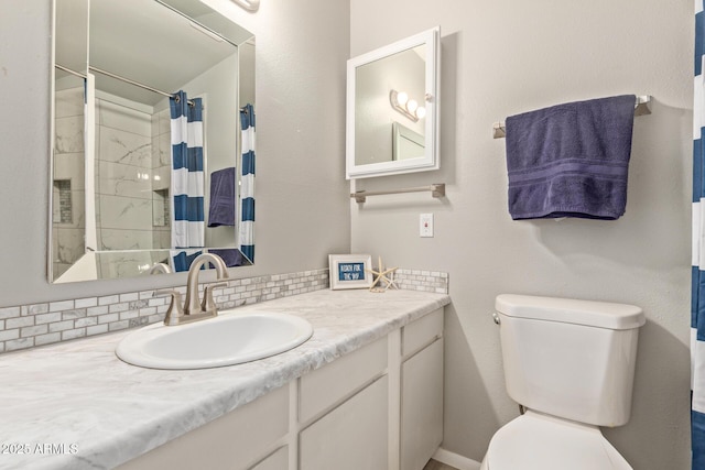 bathroom featuring vanity, curtained shower, backsplash, and toilet