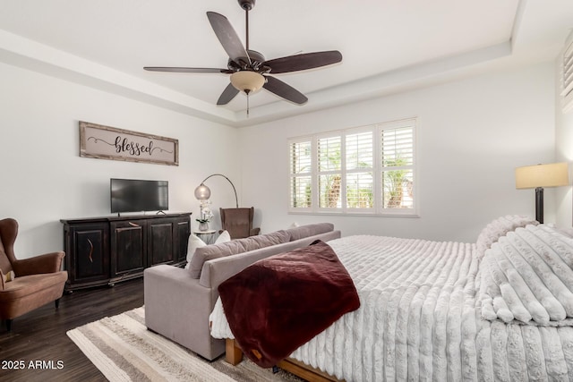 1804 W Magdalena Ln, Phoenix, AZ 85041 - bedroom with a raised ceiling, dark wood-style floors, and a ceiling fan