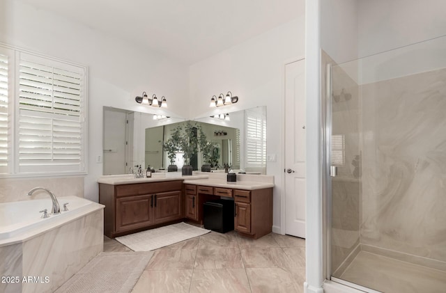1804 W Magdalena Ln, Phoenix, AZ 85041 - bathroom featuring a shower stall, a bath, and vanity
