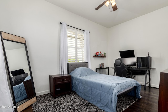 1804 W Magdalena Ln, Phoenix, AZ 85041 - bedroom with baseboards, ceiling fan, and dark wood-style flooring