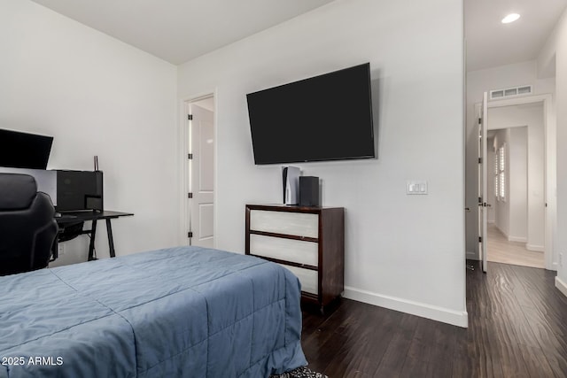 1804 W Magdalena Ln, Phoenix, AZ 85041 - bedroom with baseboards, dark wood-style flooring, and recessed lighting