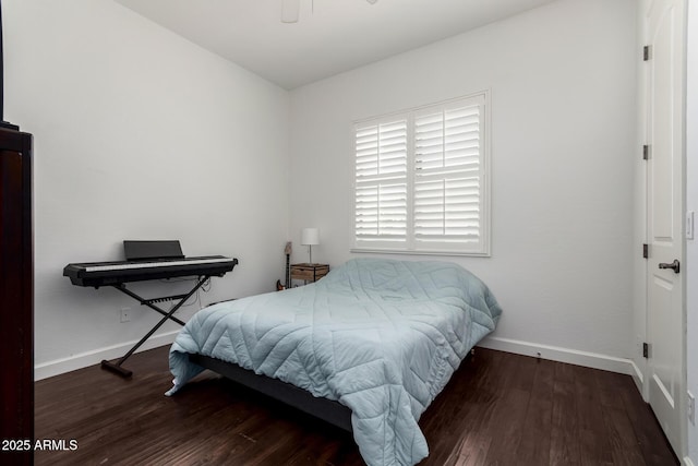 1804 W Magdalena Ln, Phoenix, AZ 85041 - bedroom with baseboards and wood finished floors