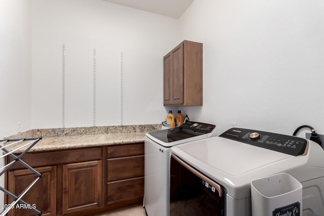 1804 W Magdalena Ln, Phoenix, AZ 85041 - laundry room with washer and dryer and cabinet space