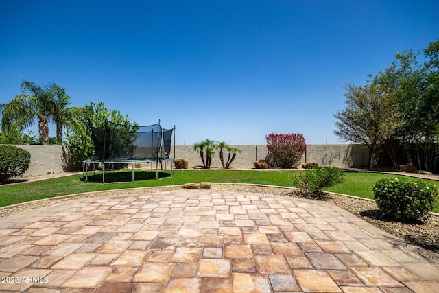 1804 W Magdalena Ln, Phoenix, AZ 85041 - view of patio with a trampoline