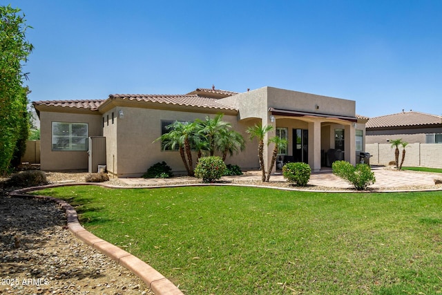 1804 W Magdalena Ln, Phoenix, AZ 85041 - rear view of house with stucco siding, a patio, and a tile roof