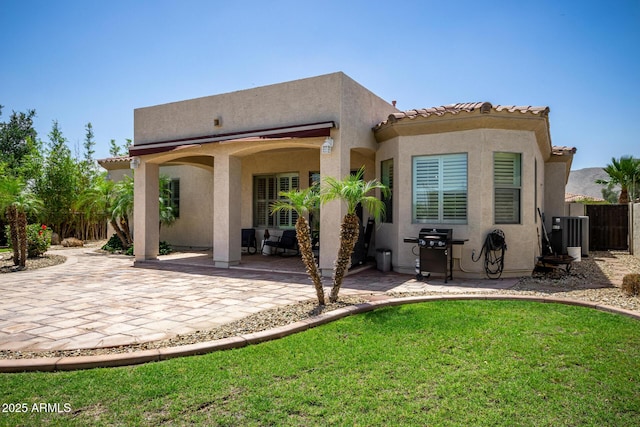 1804 W Magdalena Ln, Phoenix, AZ 85041 - back of property featuring a patio, stucco siding, and central air condition unit