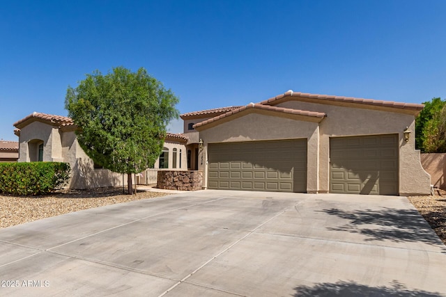 1804 W Magdalena Ln, Phoenix, AZ 85041 - view of front of property featuring stucco siding, an attached garage, concrete driveway, and a tiled roof
