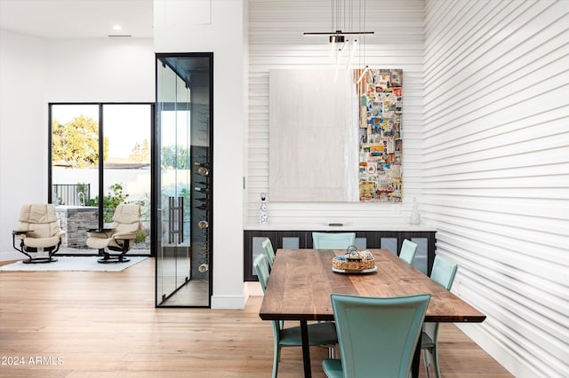 dining space featuring light hardwood / wood-style floors