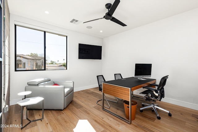 office featuring ceiling fan and light hardwood / wood-style floors