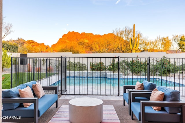 view of patio / terrace featuring a fenced in pool