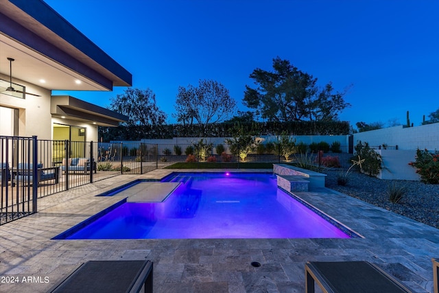 view of swimming pool featuring an in ground hot tub and a patio area