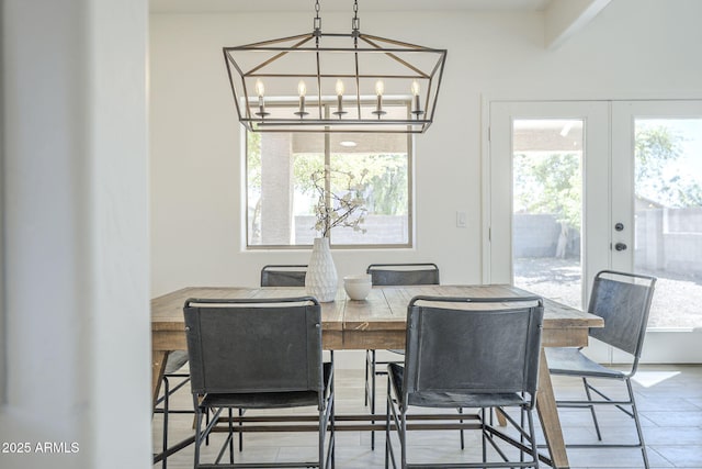 6731 W Northview Ave, Glendale, AZ 85303 - dining space featuring french doors and a chandelier