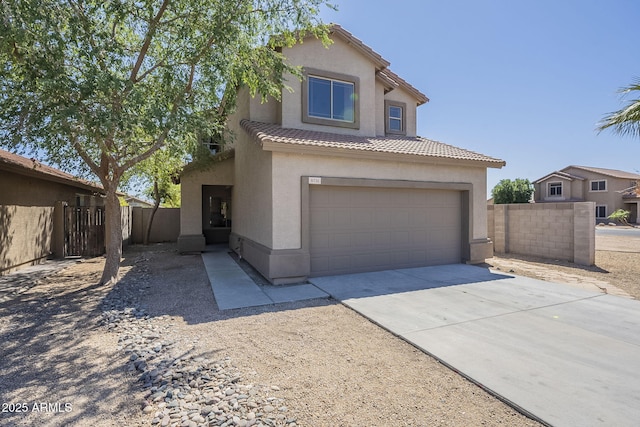 6731 W Northview Ave, Glendale, AZ 85303 - mediterranean / spanish home featuring a tiled roof, concrete driveway, fence, an attached garage, and stucco siding