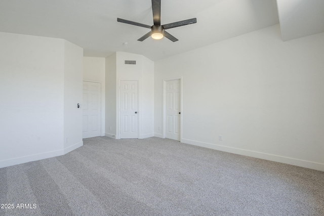 6731 W Northview Ave, Glendale, AZ 85303 - unfurnished bedroom featuring light carpet, lofted ceiling, visible vents, and baseboards