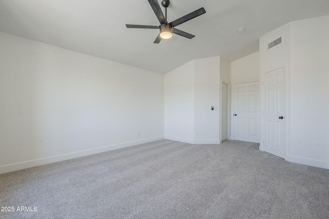 6731 W Northview Ave, Glendale, AZ 85303 - unfurnished bedroom featuring lofted ceiling, baseboards, visible vents, and light colored carpet