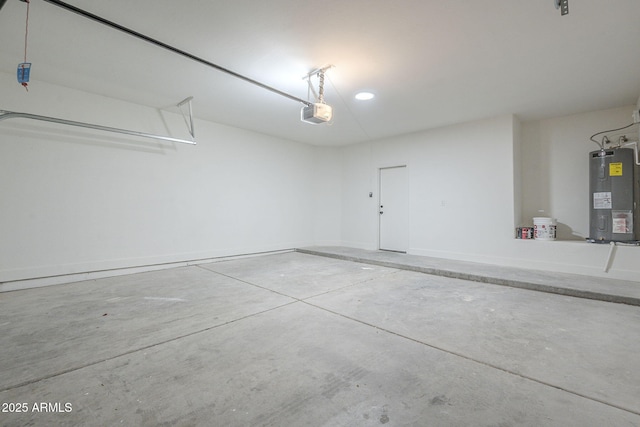 6731 W Northview Ave, Glendale, AZ 85303 - garage featuring recessed lighting, a garage door opener, and electric water heater