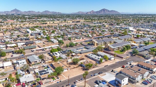 drone / aerial view featuring a mountain view