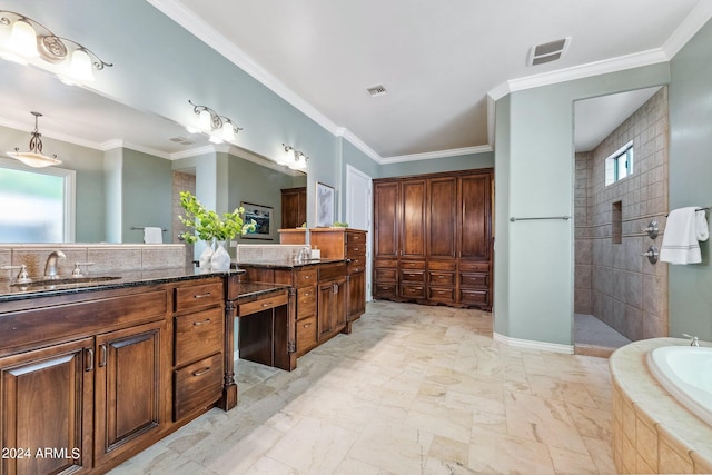 bathroom featuring vanity, ornamental molding, and shower with separate bathtub