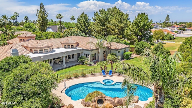 view of swimming pool with a patio