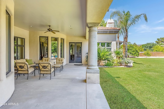 view of patio featuring ceiling fan and an outdoor living space