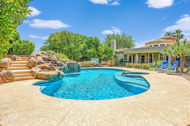 view of swimming pool featuring a patio