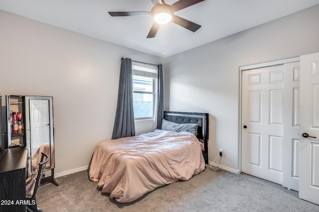 carpeted bedroom featuring ceiling fan