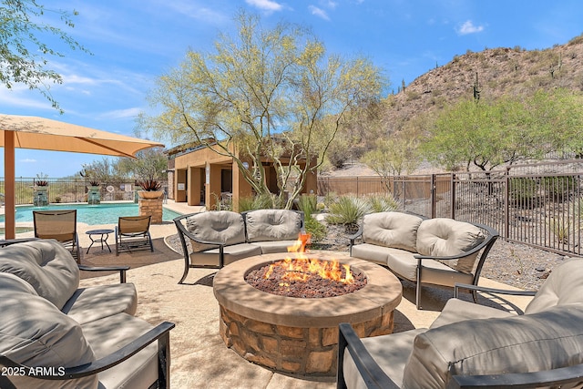 36600 N Cave Creek Rd Unit 9B, Cave Creek, AZ 85331 - fenced backyard featuring an outdoor living space with a fire pit, a patio area, and a mountain view