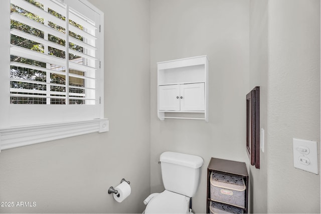 bathroom featuring toilet