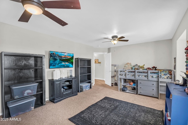 living room featuring carpet flooring and ceiling fan
