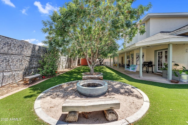 view of yard with a fenced backyard and a patio area