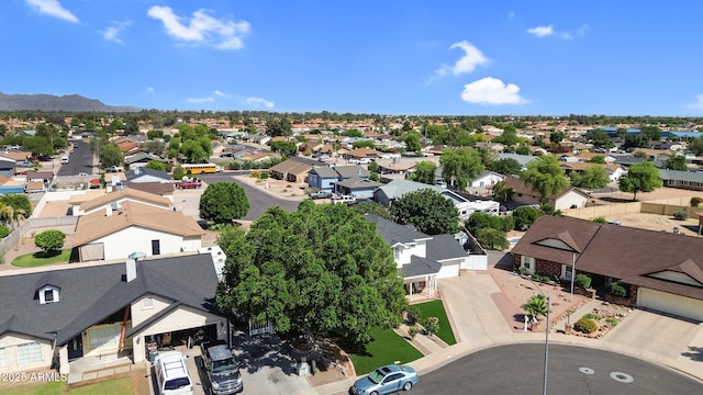 drone / aerial view featuring a mountain view and a residential view